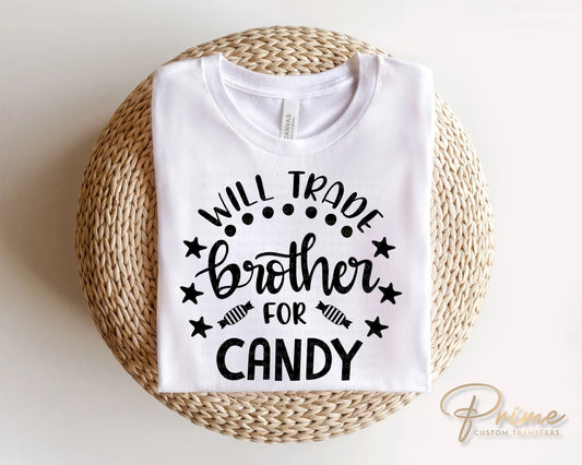 A cold peel halloween direct to film transfer with the saying "Will Trade Brother For Candy" in black or white writing.