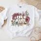 A direct to film transfer that has a floral background with the words Fur Mama overlayed on top. Fur Mama is written in a white colored retro font. The DTF transfer is a cold peel ready to press transfer.