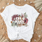 A direct to film transfer that has a floral background with the words Fur Mama overlayed on top. Fur Mama is written in a white colored retro font. The DTF transfer is a cold peel ready to press transfer.