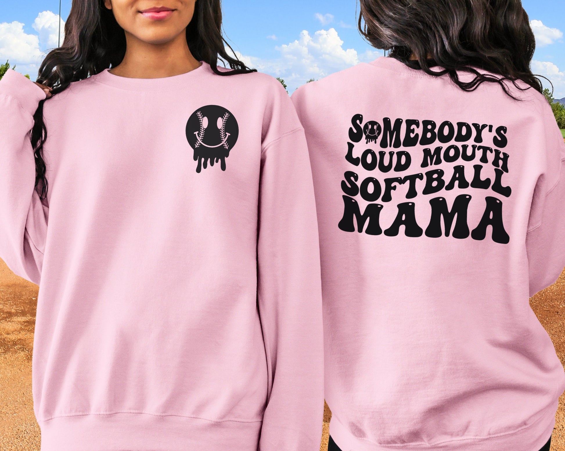 A direct to film transfer that says Somebody&#39;s Loud mouth Softball Mom. Back and front option. Front design is of baseball smiley face. The DTF transfer is a cold peel ready to press transfer.