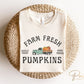 A DTF transfer with the words &quot;Farm Fresh Pumpkins&quot; with a picture of an old vintage truck with pumpkins in the back.