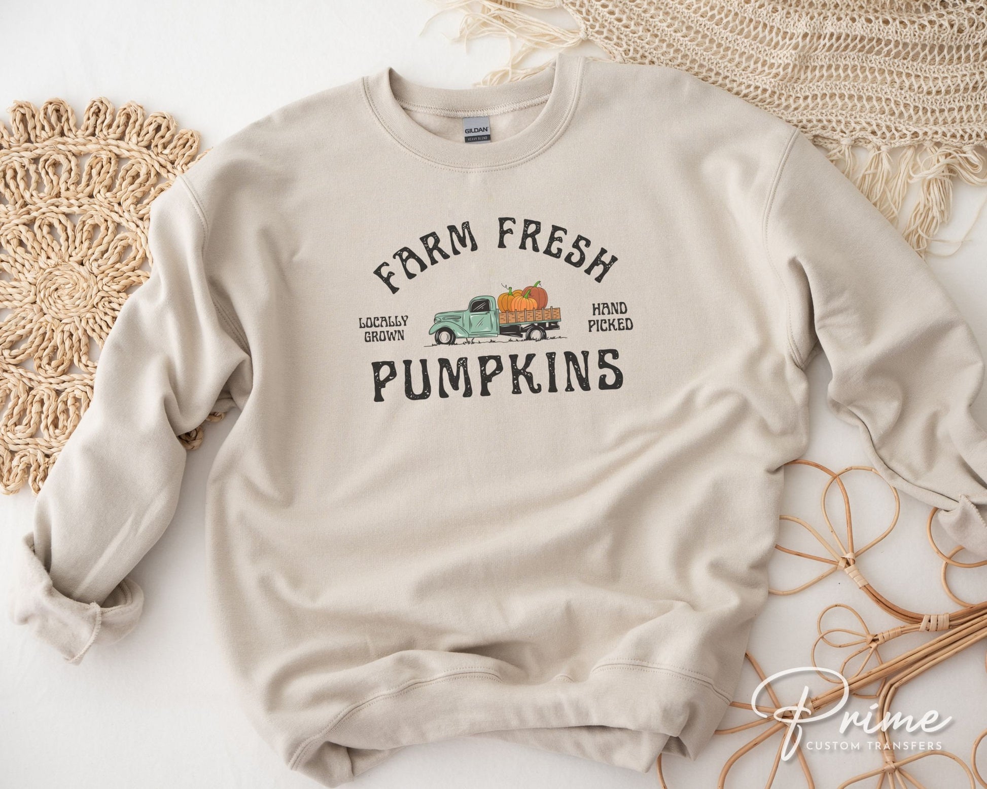 A DTF transfer with the words &quot;Farm Fresh Pumpkins&quot; with a picture of an old vintage truck with pumpkins in the back.