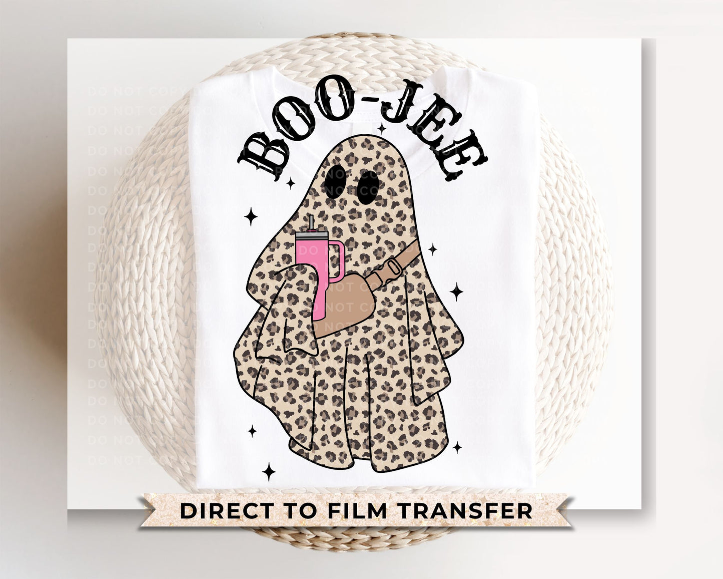 A cold peel direct to film transfer with a leopard patterned ghost holding a tumbler with the words boo-jee above it
