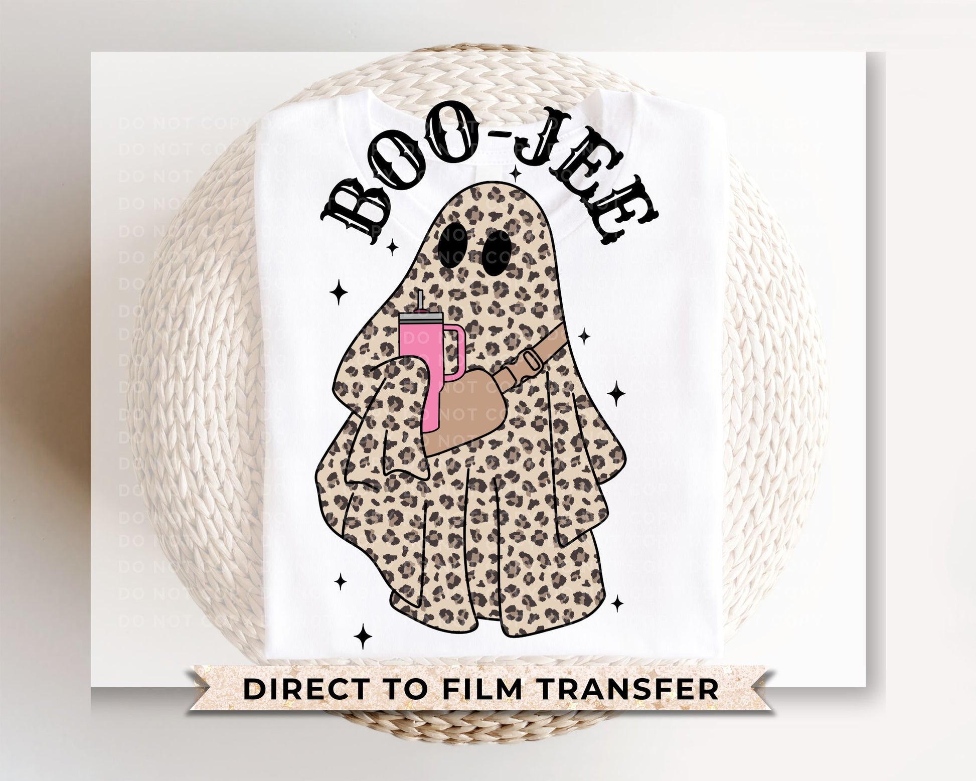 A cold peel direct to film transfer with a leopard patterned ghost holding a tumbler with the words boo-jee above it