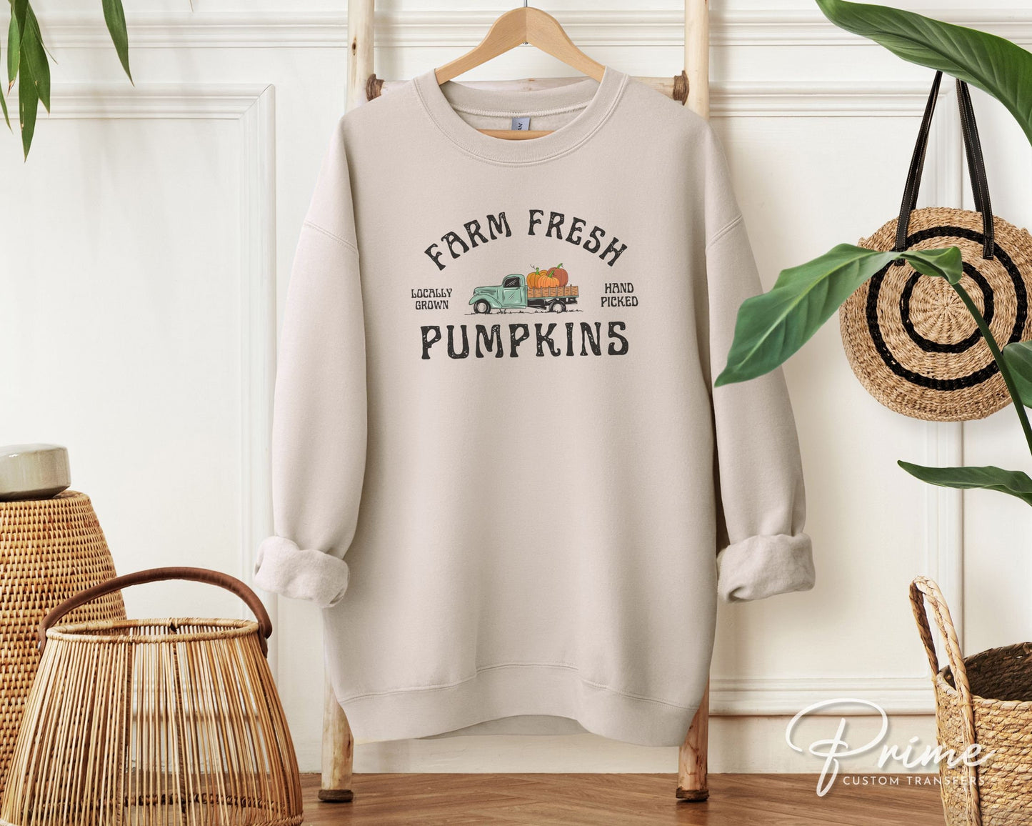 A DTF transfer with the words &quot;Farm Fresh Pumpkins&quot; with a picture of an old vintage truck with pumpkins in the back.