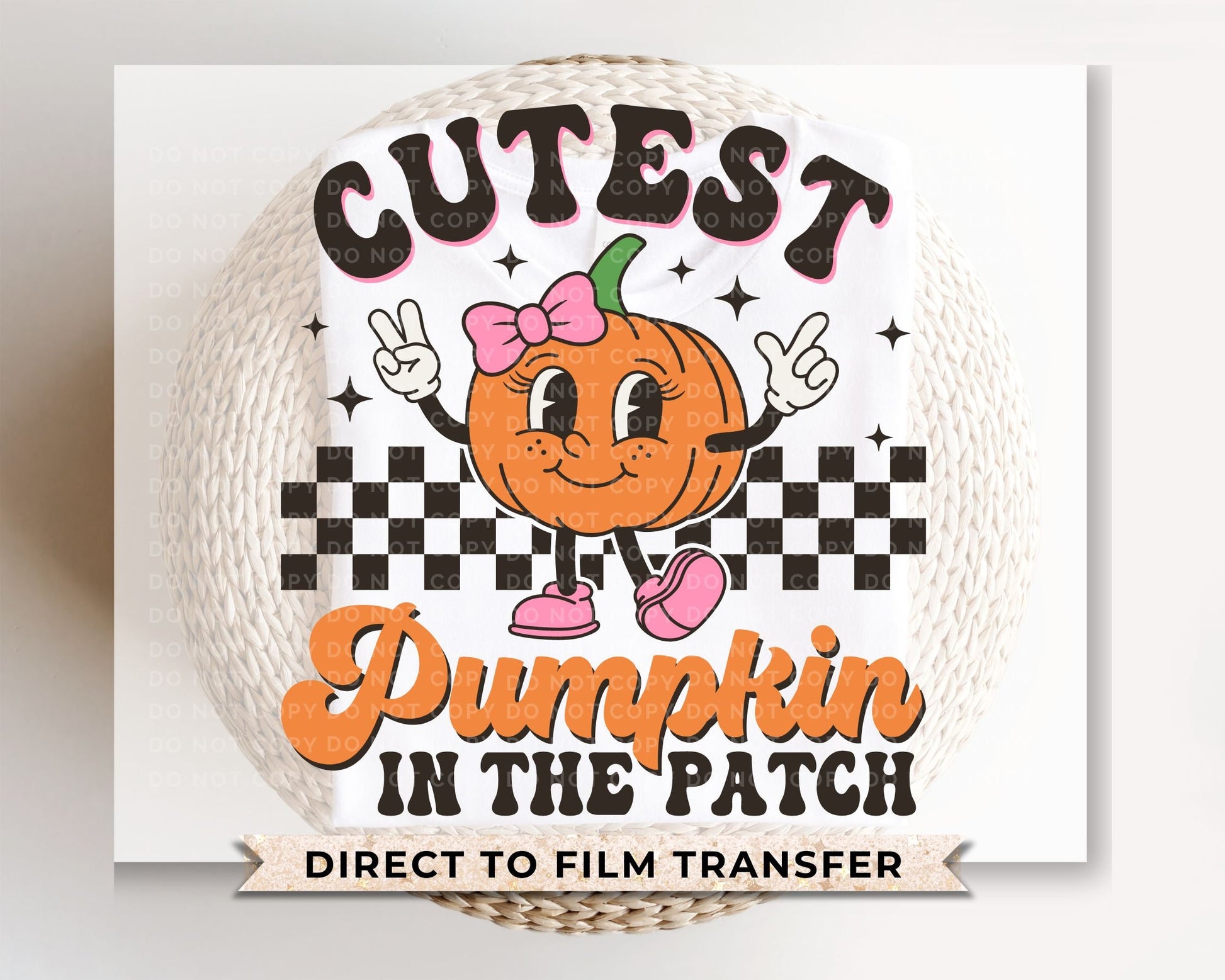 A cold peel direct to film transfer of a cute retro girl pumpkin with the words &quot;Cutest Pumpkin in The Patch&quot; in a curvy font.