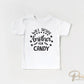A cold peel halloween direct to film transfer with the saying "Will Trade Brother For Candy" in black or white writing.