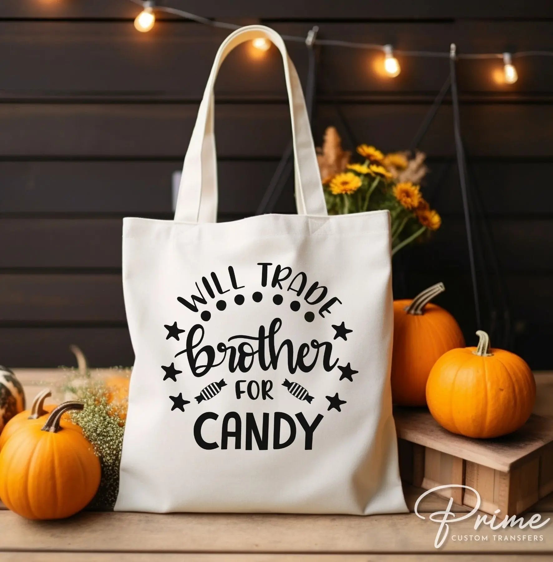 A cold peel halloween direct to film transfer with the saying "Will Trade Brother For Candy" in black or white writing.