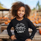 A cold peel halloween direct to film transfer with the saying "Will Trade Brother For Candy" in black or white writing.